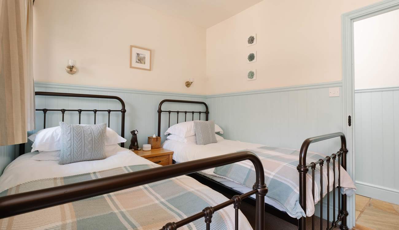 This delightful twin room is so welcoming.