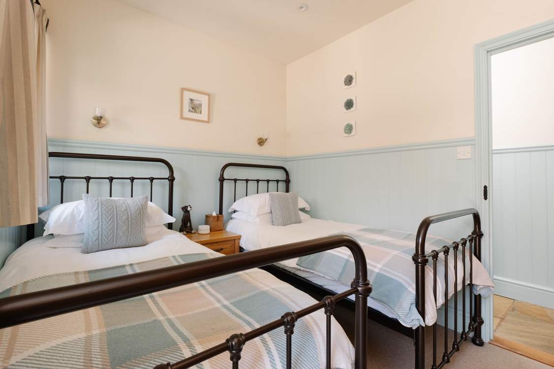 This delightful twin room is so welcoming.