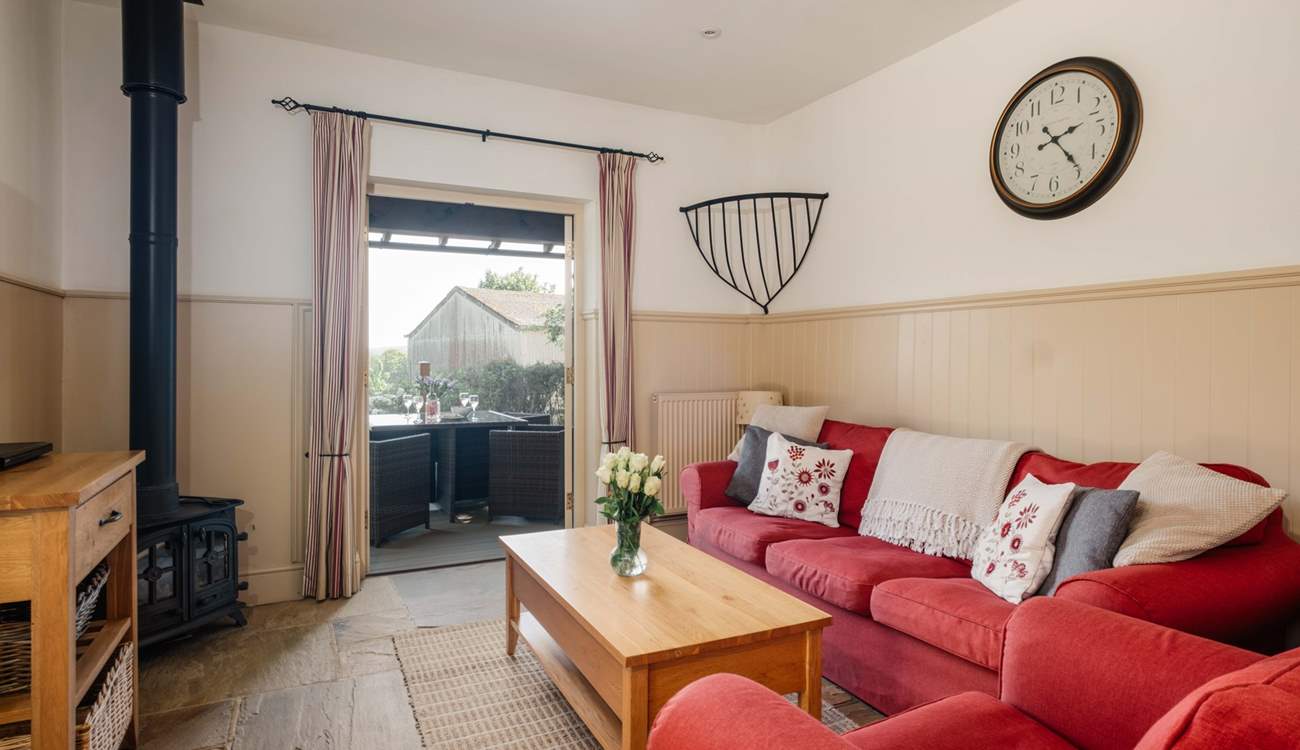 Double doors from the living area open onto the private decking.