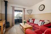 Double doors from the living area open onto the private decking.