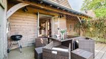 The private decking with barbecue.