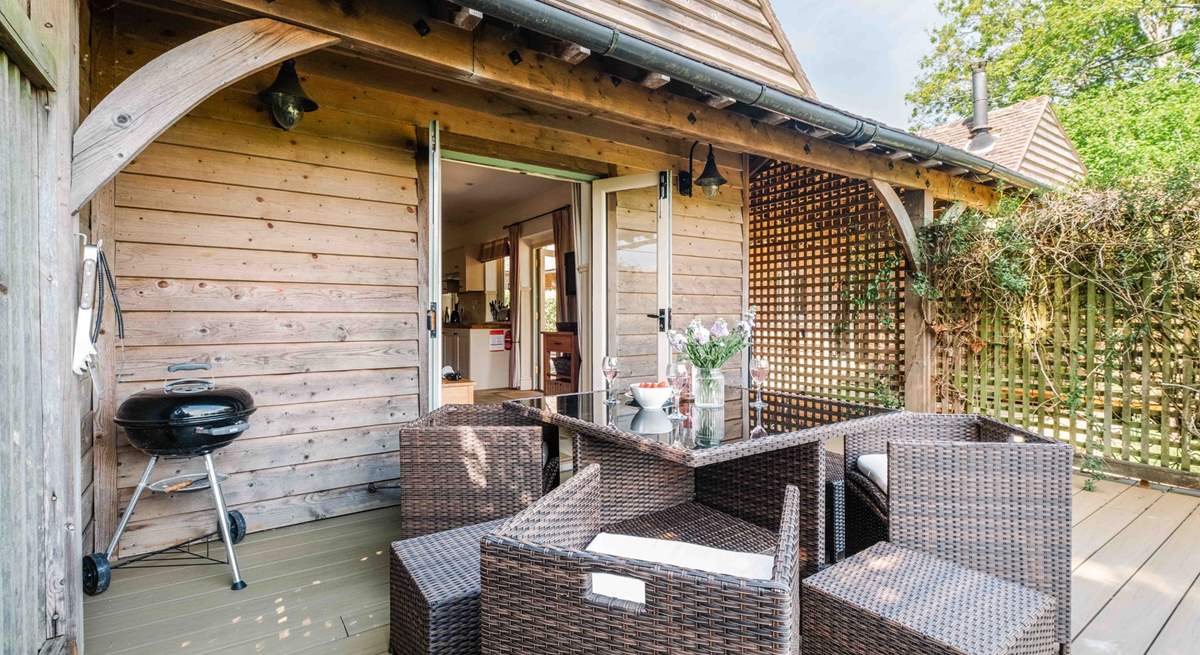 The private decking with barbecue.