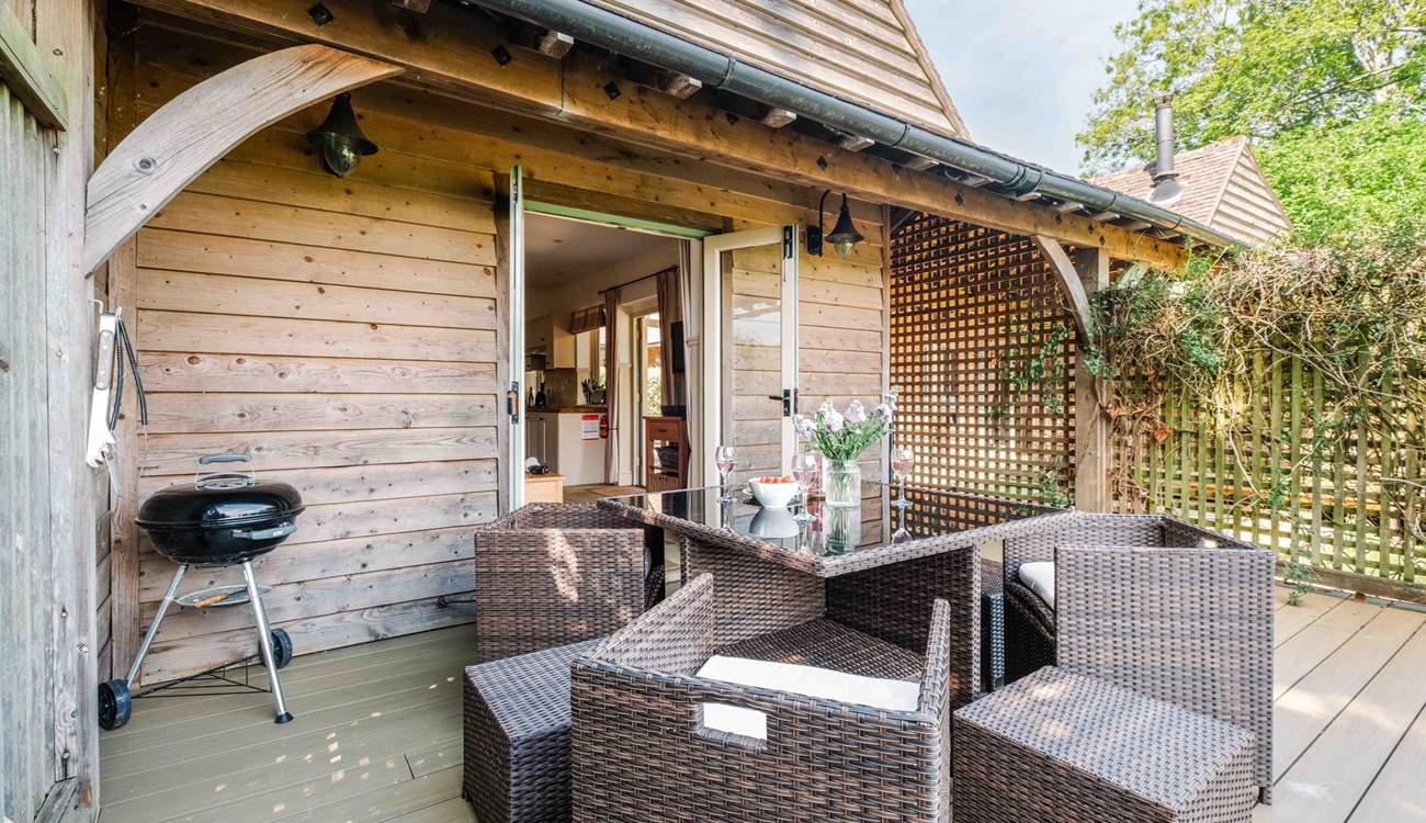 The private decking with barbecue.