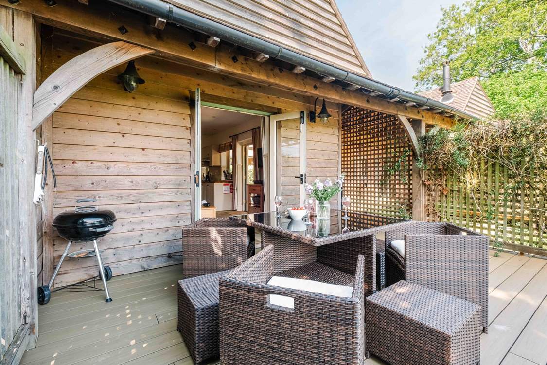 The private decking with barbecue.