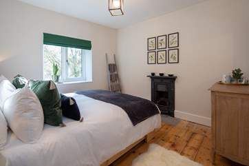 Bedroom 2 is such a welcoming room. This 'zip and link' king-size bed can be split to form two 2'6'' twin beds.