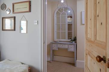 Peeking into the hallway from the sitting-room. Beautiful touches at every turn.