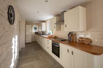 The kitchen offers the perfect space to whip up a feast.
