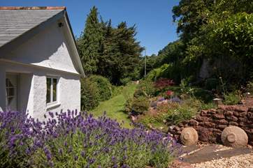 Looking down from the raised patio area. The perfect spot to enjoy a good book in the sun or spark up the barbecue.