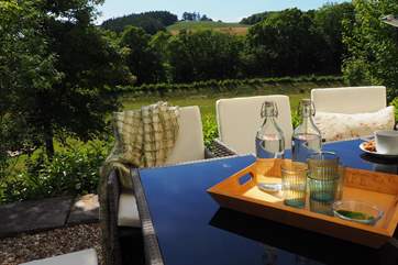 Dine outside with the most fabulous views across the gardens and beyond to the rolling hills.