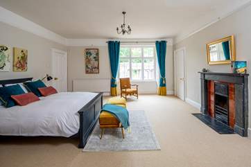 This grand Victorian house retains many original features including the cast iron fireplaces in some of the bedrooms.
