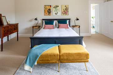 One of the gorgeous en-suite bedrooms, decorated in rich colours from the Orient.