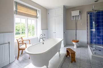 The ensuite bedroom to the blue room also has a roll top bath.
