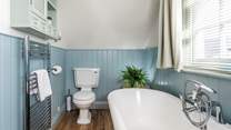 There's a lovely deep roll-top bath for relaxing soaks.