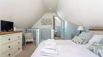 The bedroom leads onto the bathroom.