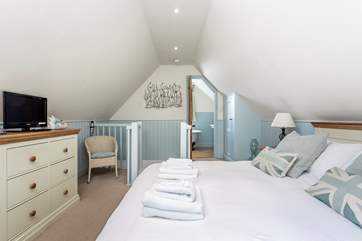 The bedroom leads onto the bathroom.