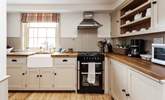 The fully equipped kitchen is perfect for preparing that special meal. - Thumbnail Image