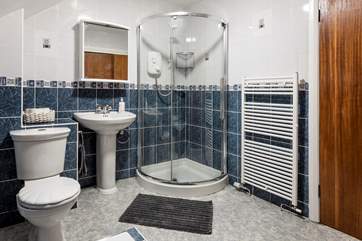The shower cubicle in the bathroom.
