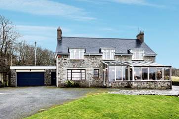 Seaside House sits proud in its setting above Little Haven beach.