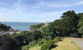 Nestling in a spectacular setting with far reaching coastal views and spacious gardens. - Thumbnail Image