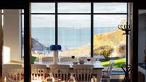 Dine with a glorious far-reaching sea view. The perfect spot to enjoy magnificent sunsets. 