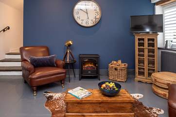 To make the room extra cosy, The Lambing Shed has an electric stove - all the romance of a wood-burning stove without the effort!