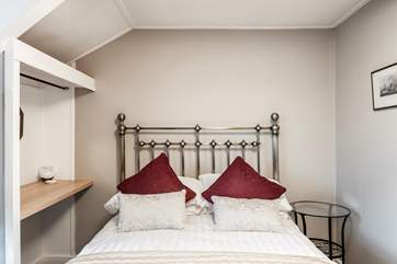 Bedroom 5 with its cosy double bed.