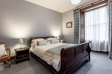 Spacious Bedroom 3 with king-size bed.