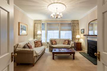 Cosy sitting-room with window overlooking St Davids' square.