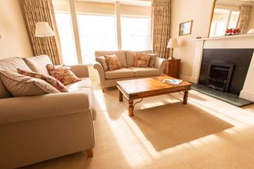 Cosy sitting-room with window overlooking St David's square.