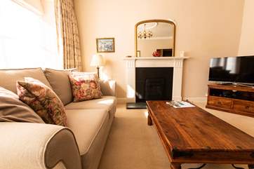 The sitting-room overlooks the square.