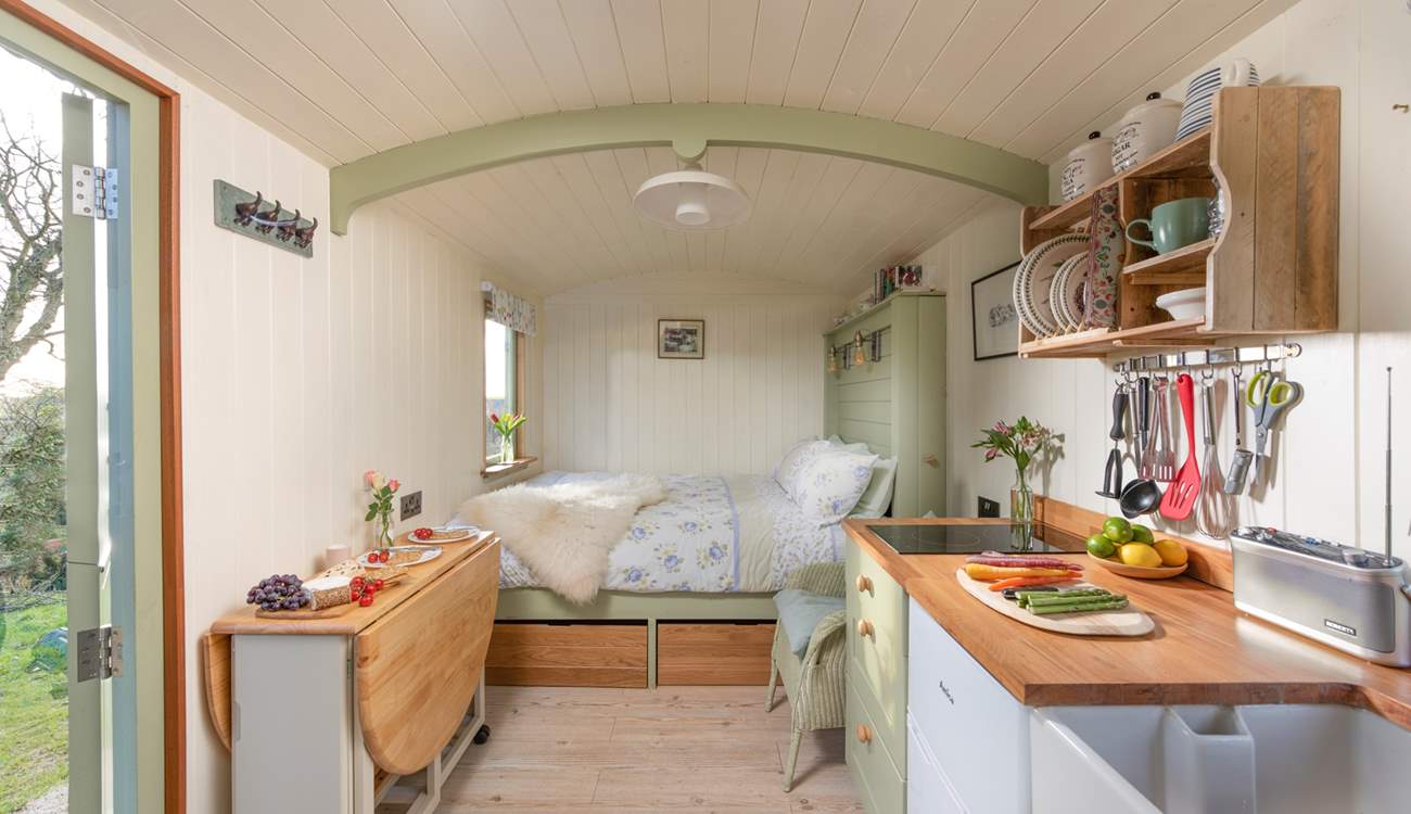 Step inside the hut to be greeted with sweet countryside charm.