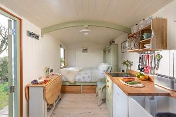 Step inside the hut to be greeted with sweet countryside charm.