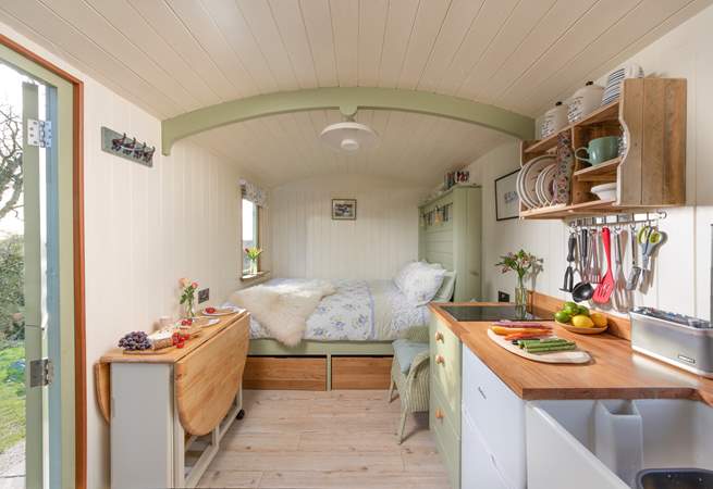 Step inside the hut to be greeted with sweet countryside charm.
