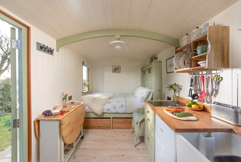 Step inside the hut to be greeted with sweet countryside charm.