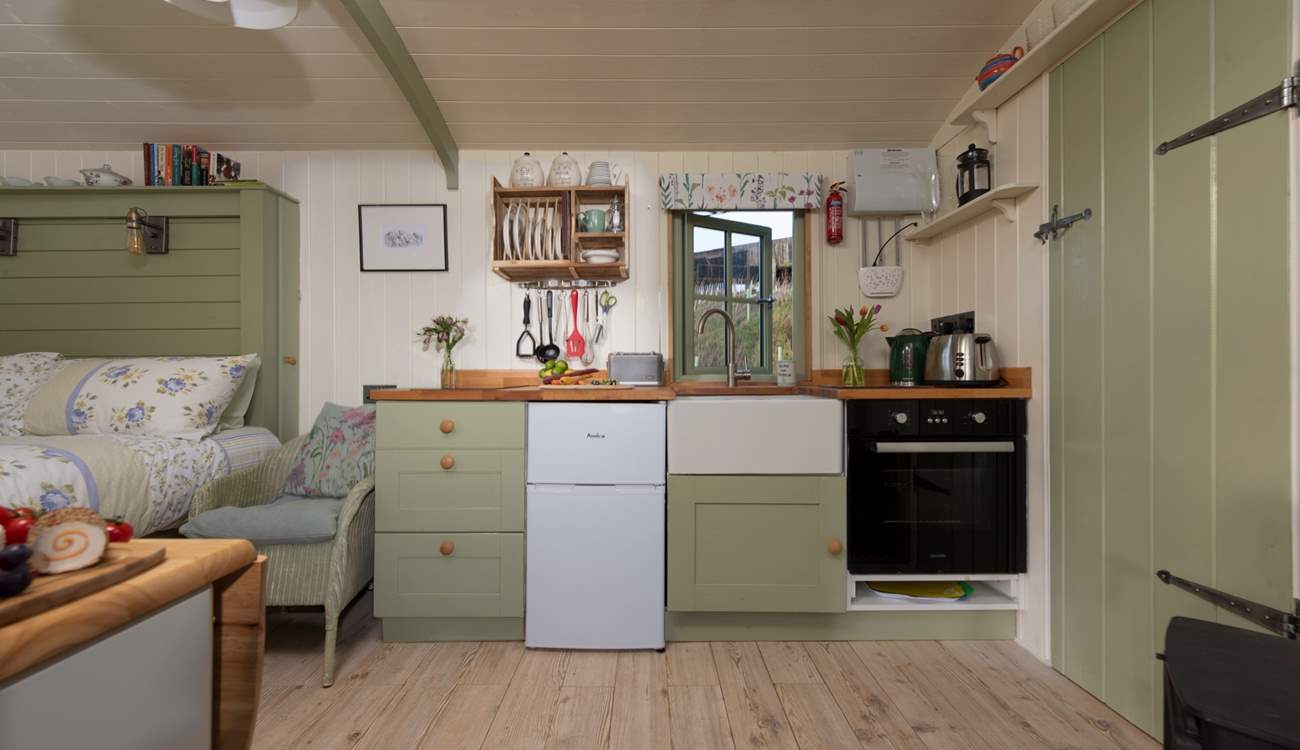 The kitchen is complete with all you could need to rustle up dinner for two. 