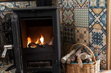 The toasty wood-burner ensures cosiness all year round.
