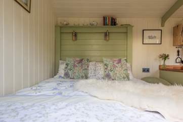 A soft and calming colour scheme runs throughout.