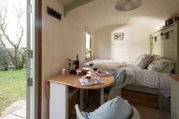 The sweet dining table can be folded away for extra space when needed.