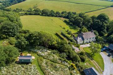 Surrounded by patchwork farmland and rolling countryside.