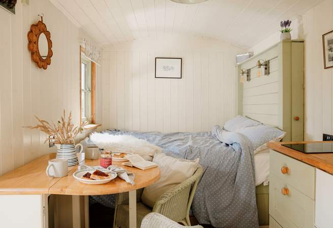 The sweet dining table can be folded away for extra space when needed. 