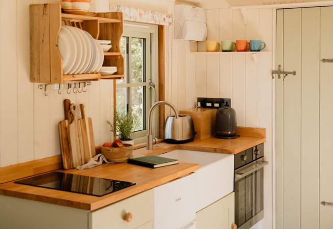 The kitchen is complete with all you could need to rustle up dinner for two. 