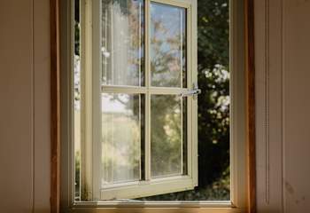 With wildflower meadows all around, wake up to beautiful countryside views.