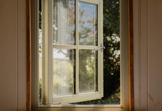 With wildflower meadows all around, wake up to beautiful countryside views.