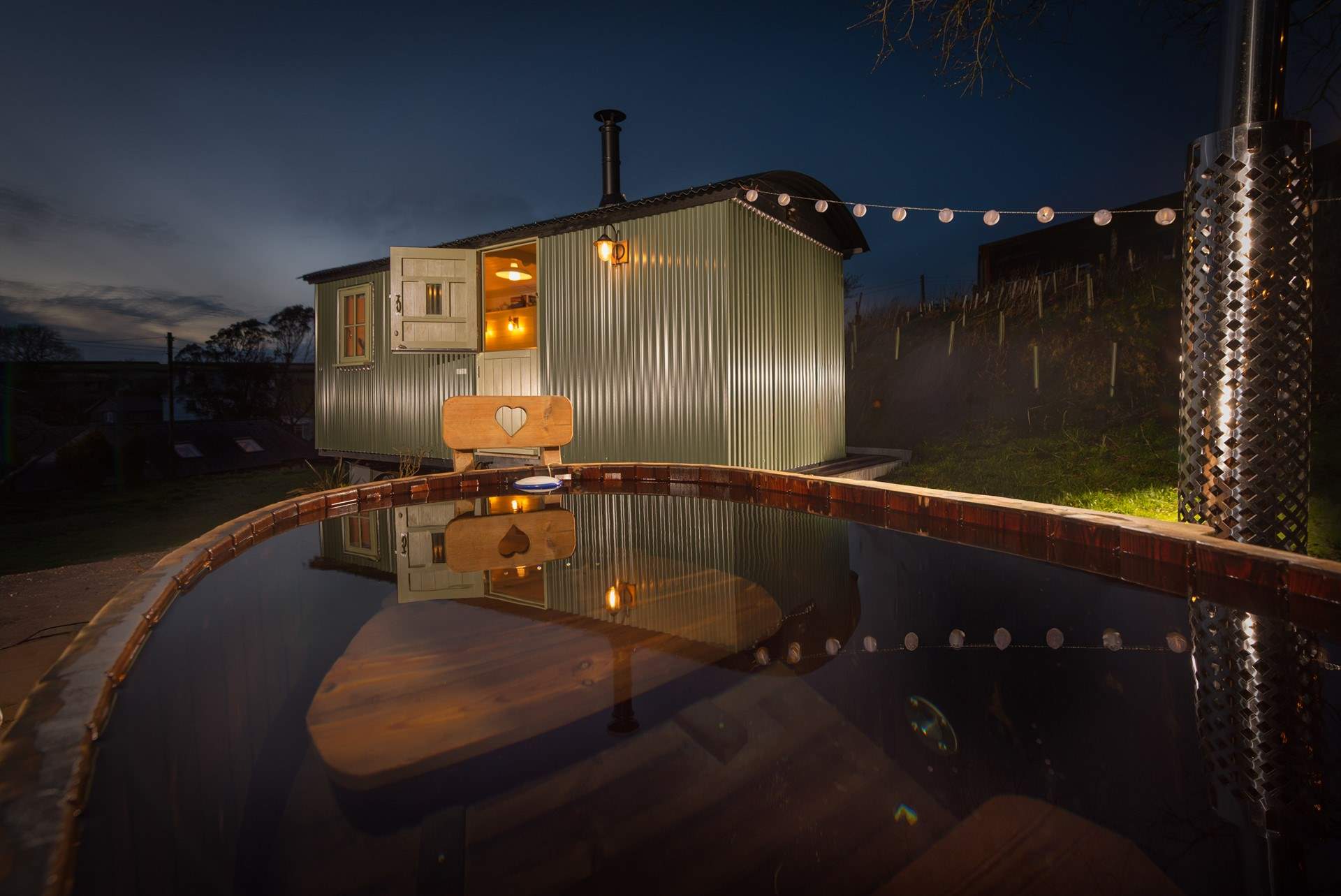 Set beside your hideaway, a wood-fired hot tub offers a wonderfully indulgent spot for long soaks beneath starry skies.