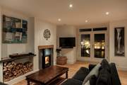 The lovely sitting room with Smart TV and views across the harbour, what a wonderful place to relax