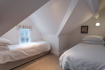Loft twin room, please take care with the sloping ceiling.