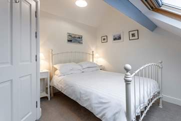 Bedroom four on the second floor with a Velux window.