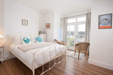 Bedroom one has a private balcony and en suite shower room.