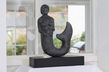 There are beautiful touches throughout. This stunning mermaid was hand-made by the same lady who crafted the mermaid in the rock on Crantock beach.