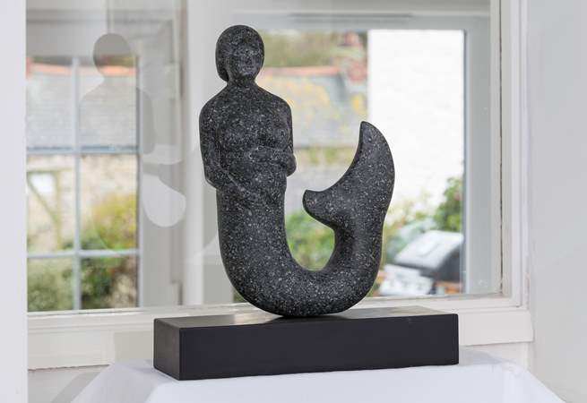 There are beautiful touches throughout. This stunning mermaid was hand-made by the same lady who crafted the mermaid in the rock on Crantock beach. 